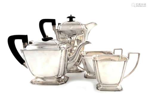 A matched four piece silver tea set, by Henry Atki…