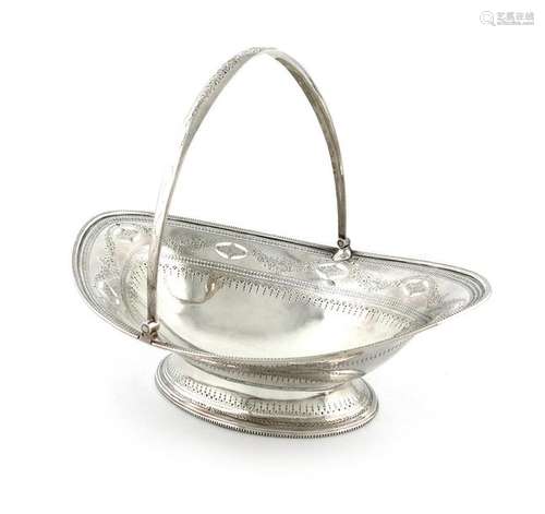 A George III silver swing handled basket, by Thoma…