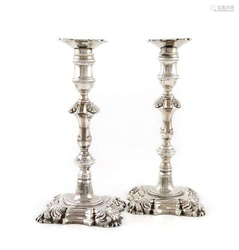 A pair of George II silver candlesticks, by John C…