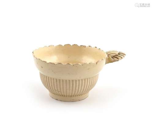 A rare creamware wine taster, c.1770, the circular…