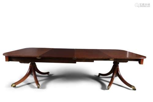 A LARGE REGENCY TWIN PILLAR DINING TABLE, of recta…