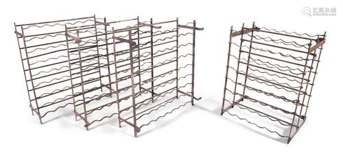 FOUR OF VICTORIAN IRON WINE BOTTLE RACKS. C.91cm h…