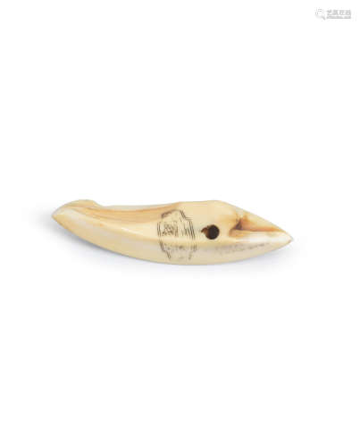 Iwami Province, late 18th century A small boar-tusk netsuke with a landscape and poem