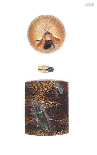 The inro and netsuke by Shokansai, Iwami Province, early 19th century; the ojime, early 19th century A black-lacquer two-case inro, manju netsuke in the form of a honey bee on a chrysanthemum and ojime in the form of a cicada