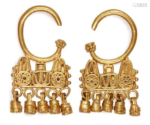 A pair of ancient gold earrings, the semi-circular hoop with tri-part elements below containing wire