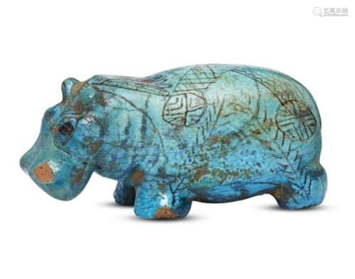 An Egyptian turquoise glazed composition hippopotamus, Second Intermediate Period, circa 1786-1590