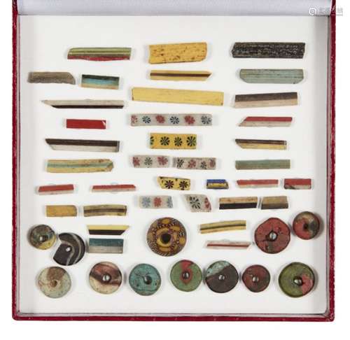 A collection of ancient Roman and Egyptian glass fragments, 2nd century B.C. to 1st century A.D.,