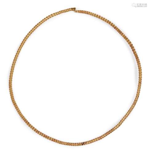 A twisted solid gold torc necklace, 16.5cm. diam., weight 60.5gr. Provenance: Property of a