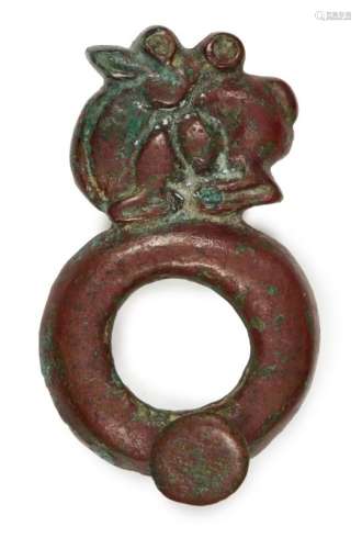 An Ordos bronze fastening with hare or deer, 5th-4th century B.C., of open circular form, surmounted