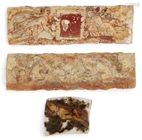 Three reverse painted glass fragments, Renaissance period or earlier, two rectangular plaques or