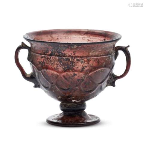 A Late Roman or Byzantine two-handled footed cup, probably 6th-7th century AD, made in brownish-