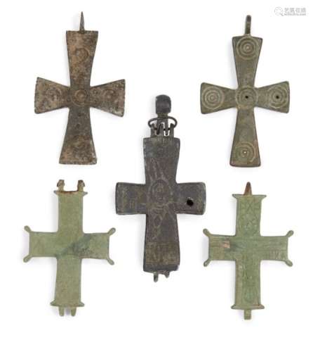 A group of Byzantine bronze cross pendants, circa 5th-10th century, engraved with design of