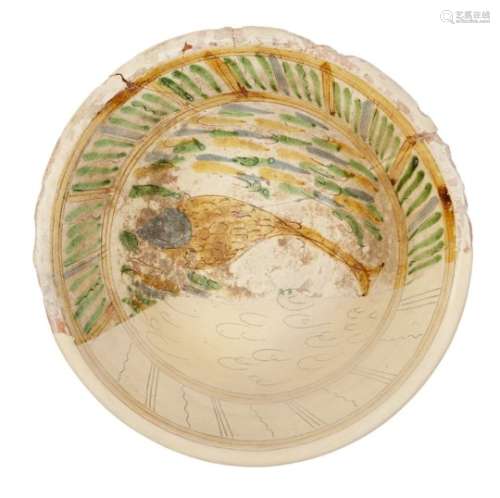 A very large Byzantine fragmentary pottery bowl, 6th-7th century, decorated to the interior with