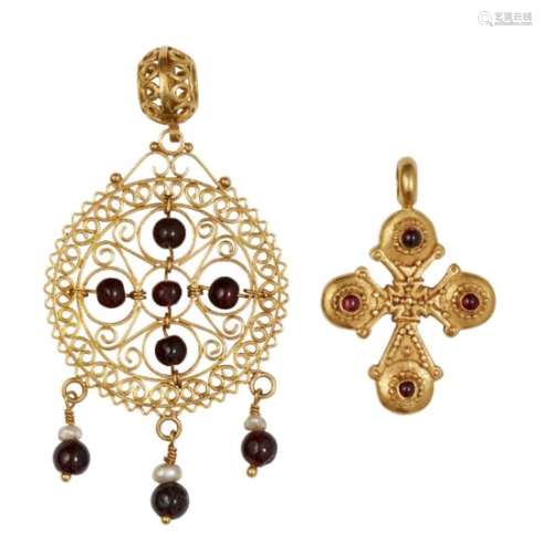 A Byzantine-style filigree pendant and gold cross pendant, both set with red stones, 4cm. high and