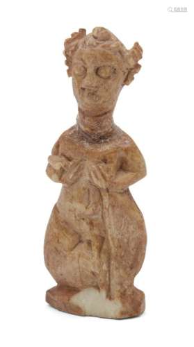 A Sasanian ivory fertility figure, Iran, 6th century, carved as a woman in a seated position,