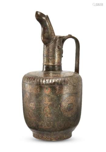 A large unusual Khorasan copper inlaid bronze ewer, Iran, 12th-13th century, with cylindrical