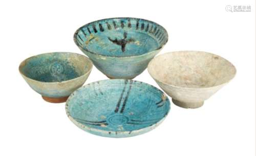 A group of pottery bowls, Iran and Afghanistan, 12th century, three of conical form, one of