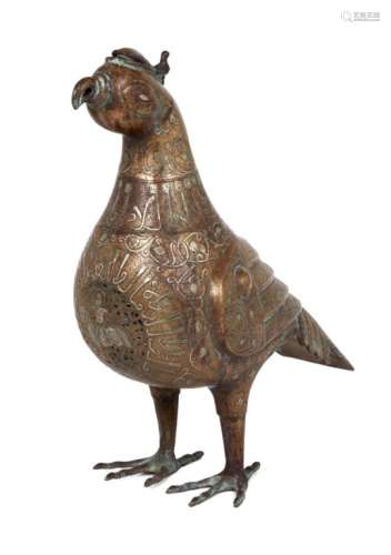 A large silver inlaid brass bird incense burner, Khorasan-style, 20th century, shown standing, his