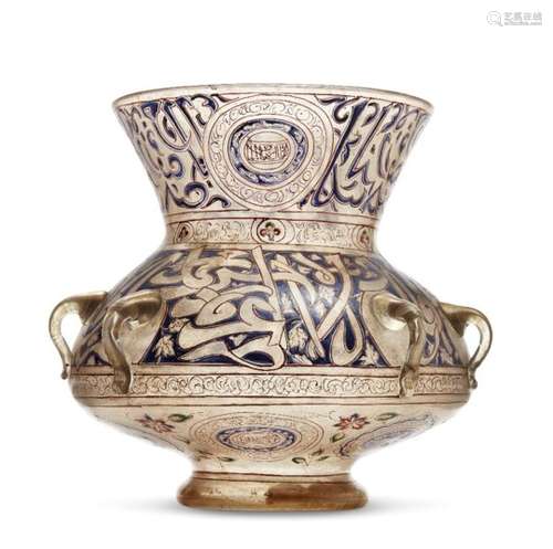 An intact gilded and enamelled glass mosque lamp, Egypt, late 19th century, on a short, rounded