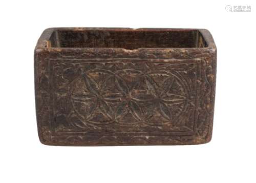 A carved wood box, Spain, 11th -12th century, of deep rectangular form, carved to exterior with a