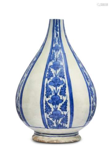 A Safavid blue and white bottle vase, Persia, 17th century, pyriform with bulbous base supported