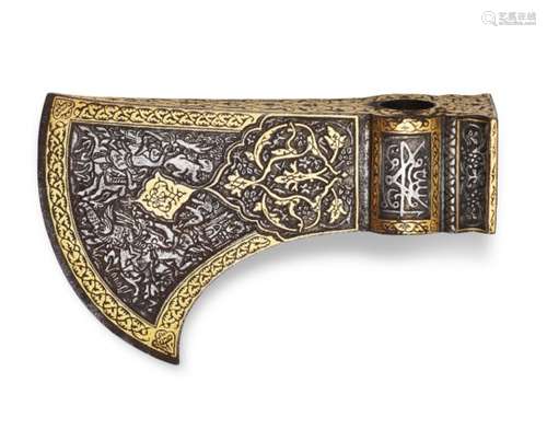 An important Safavid damascened steel axe head 'tabar' , Iran, signed 'Ali Muhammed Reza, dated