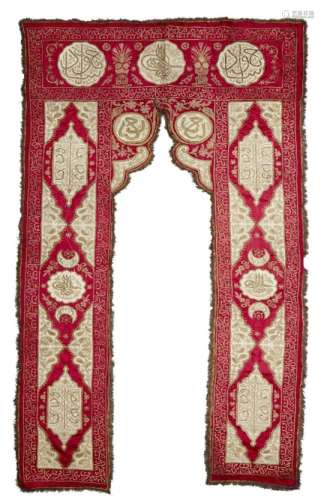 Two Ottoman matching embroidered silk portieres, Turkey, late 19th-early 20th century, of arched