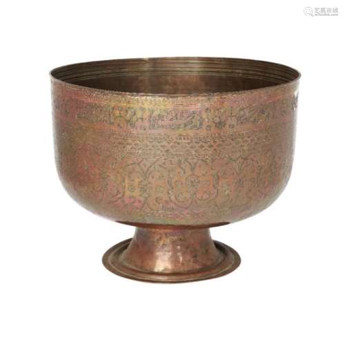 A large engraved copper footed bowl, Iran, 18th century, on spreading foot, the deep bowl engraved