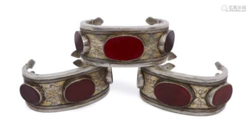 Three Turkman silver parcel gilt bracelets, Tekke, 19th-20th century, each with the horizontal