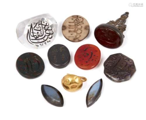 A group of carved personal seals comprising a cut rock crystal seal inscribed with the date of