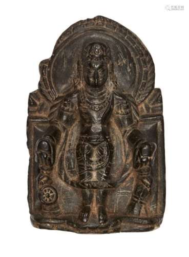 A Pala period black stone carving, Eastern India, 12th century, carved in relief with arched