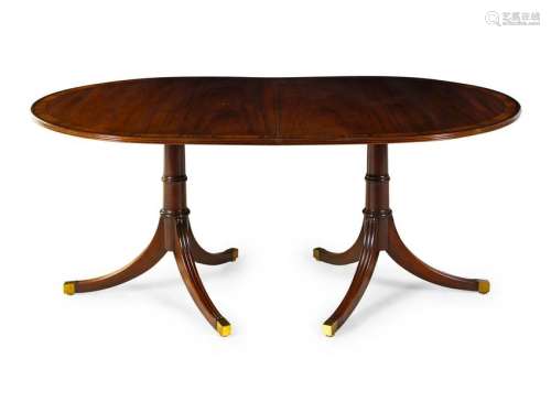 A Regency Style Figured Mahogany Two-Pedestal Dining
