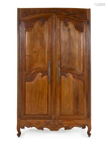 A French Provincial Walnut Armoire