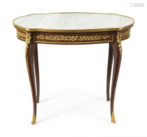 A Louis XV Style Gilt Bronze Mounted Table