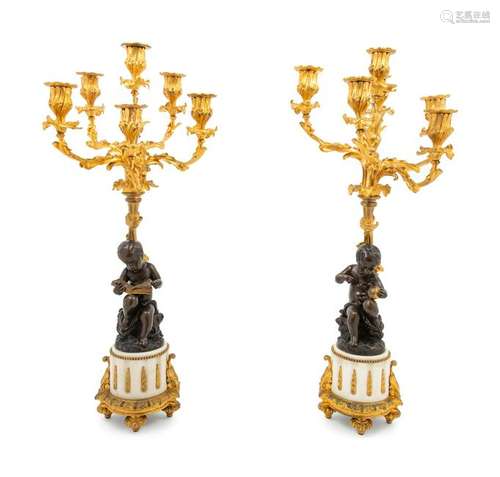 A Pair of Louis XVI Style Gilt and Patinated Bronze