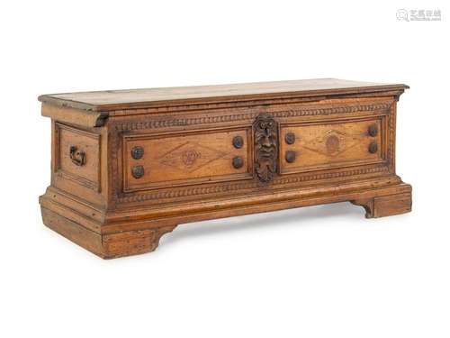 An Italian Carved Walnut Cassone