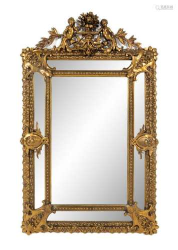 An Italian Baroque Giltwood Mirror