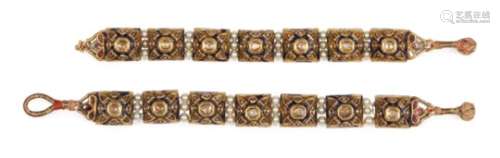 A pair of gold pearl and gem-set enamelled bracelets, India, late 19th-early 20th century, each