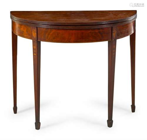 A Federal Mahogany and Marquetry Flip-Top Game Table