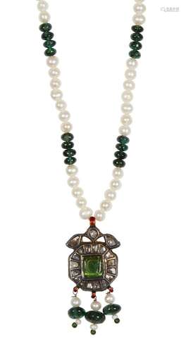 A diamond and carved emerald pendant necklace, India, 20th century, the octagonal pendant set with