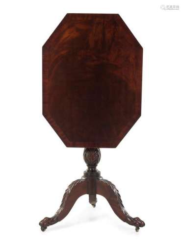 A Classical Carved and Figured Mahogany Octagonal