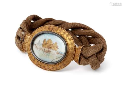 A Sikh braided hair band with miniature of the Golden Temple of Amritsar, India, 19th century, of