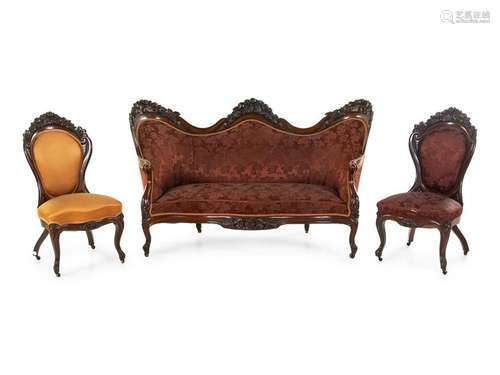 A Rococo Revival Carved Mahogany Parlor Suite