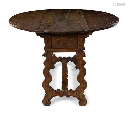 An Italian Walnut Drop-Leaf Table