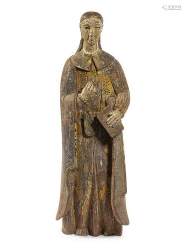 A Carved and Painted Figure of a Saint