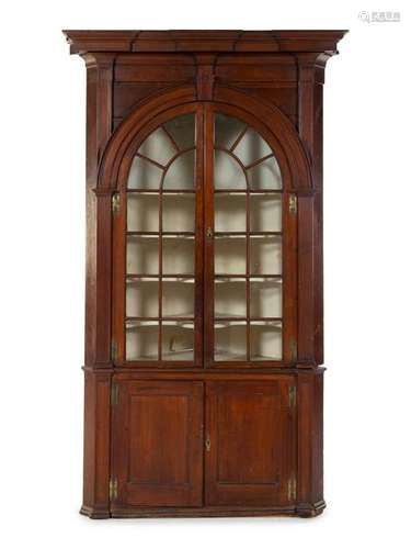 A Chippendale Mahogany Corner Cupboard