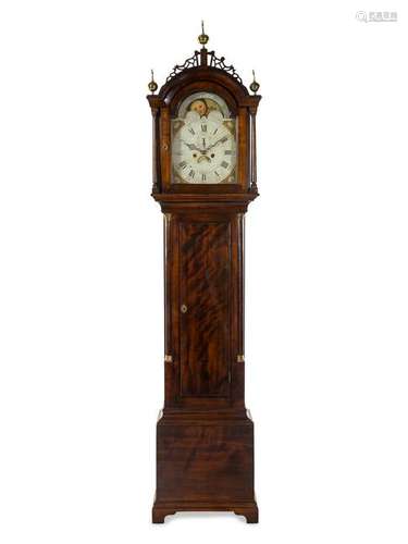 A Federal Carved and Figured Mahogany Tall Case Clock