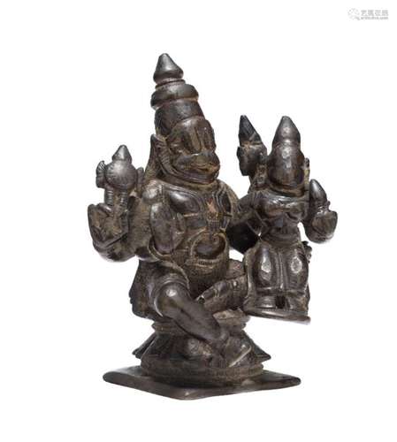 A South Indian bronze figure of Vishnu and Lakshmi, 18th century, on a square base, Vishnu shown