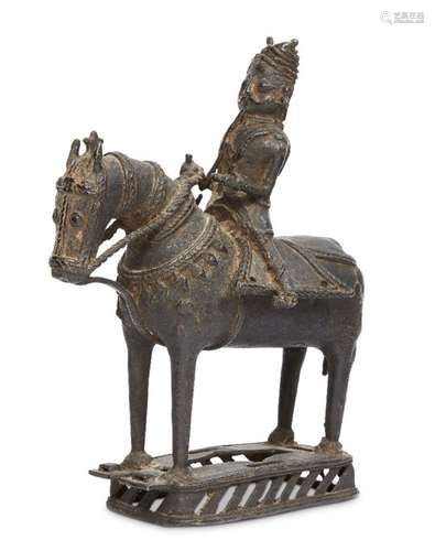 A large bronze figure on a horse, Kerala, 19th century, on a rectangular openwork plinth, the