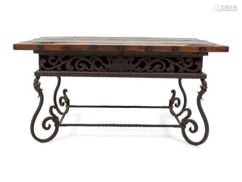 A Spanish Baroque Style Iron and Walnut Low Table